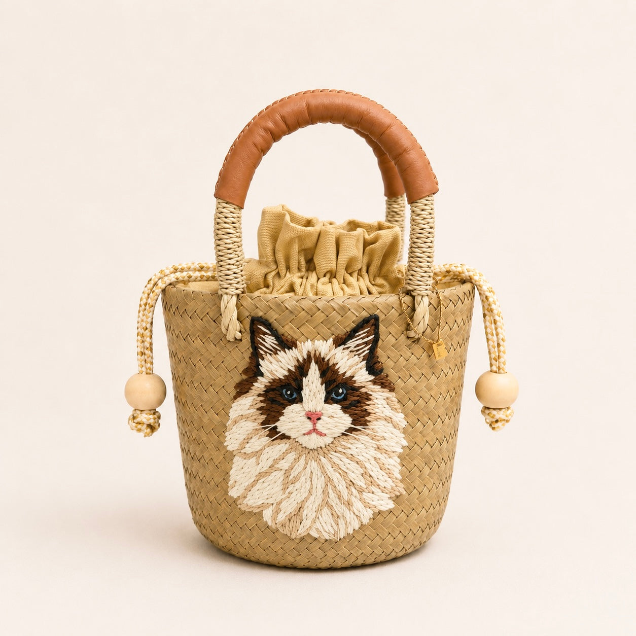 The Whisker & Wag Weave: Hand-Embroidered Krajood Handbag (Bucket)
